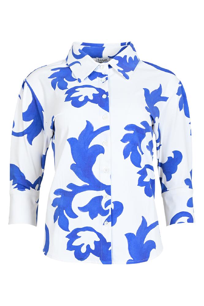 Deze blouse die komt in twee gave prints waarvan 1 rood met wit en 1 blauw met wit. De blouse is gemaakt van een lekker soepel stofje welke niet gemakkelijk kreukelt. 